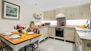 Embracing the country cottage style, the traditional shaker-style kitchen will suit your needs
