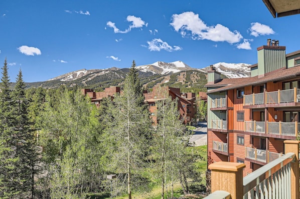 Relax on the balcony with comfortable seating and breathtaking views of the town and mountains — your perfect spot to unwind and soak it all in!