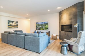 Living Room w/ Fireplace and Smart TV