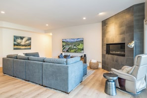 Living Room w/ Fireplace and Smart TV