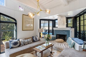 Get cozy by the fireplace.