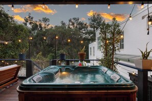 Soak in the hot tub under twinkling string lights.