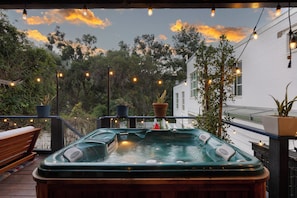 Soak in the hot tub under twinkling string lights.