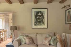 Copy sofas with seating focused around the log burner