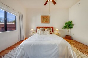 HOUSE: Bedroom 2 with queen bed, closet, and smart TV