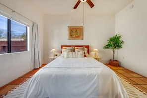 HOUSE: Bedroom 2 with queen bed, closet, and smart TV