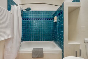 HOUSE: Bathroom 2 with beautifully tiled tub/shower combo