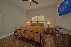 Main bedroom with King bed and TV