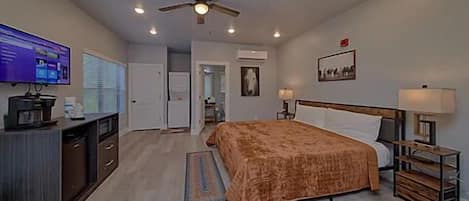 Spacious one room studio condo with king bed, tv, coffee maker, refrigerator and microwave