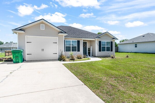 Host your loved ones in this charming home with a garage and full driveway!