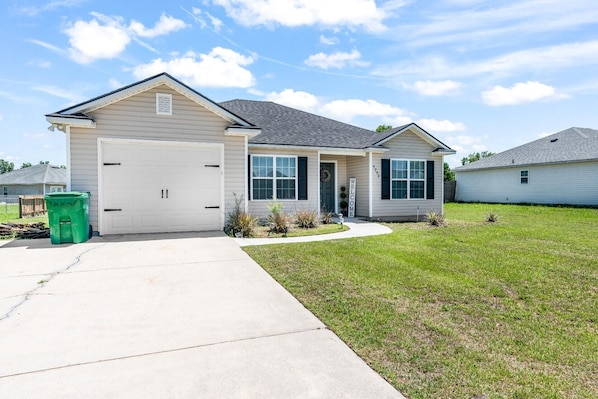 Host your loved ones in this charming home with a garage and full driveway!