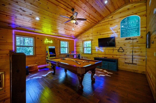 Double J Hideaway offers plenty of indoor fun with a pool table, arcade games, and classic board games for all ages.