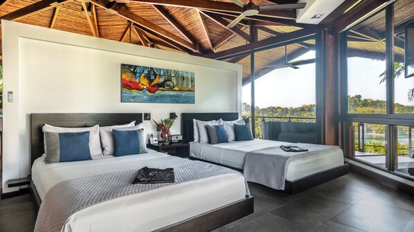 Bedroom with two queen beds and ocean and jungle views