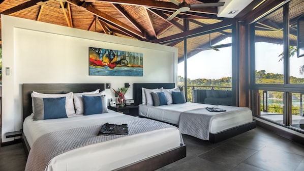 Bedroom with two queen beds and ocean and jungle views