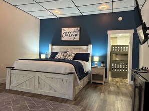 Main room with access to back bedroom. 