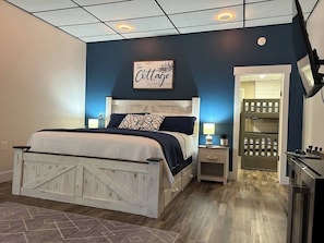 Main room with access to back bedroom.