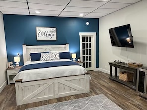 King bed with smart TV, coffee bar