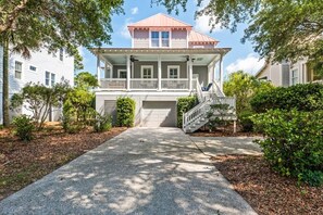 Home located in the Village of Seabrook which has their own community pool and easy access to the Lake House facilities.