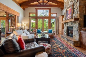 Large windows and vaulted ceilings brighten the space