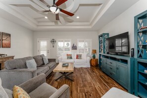 Ample space for movie night with the family surrounding the large Flat Screen TV