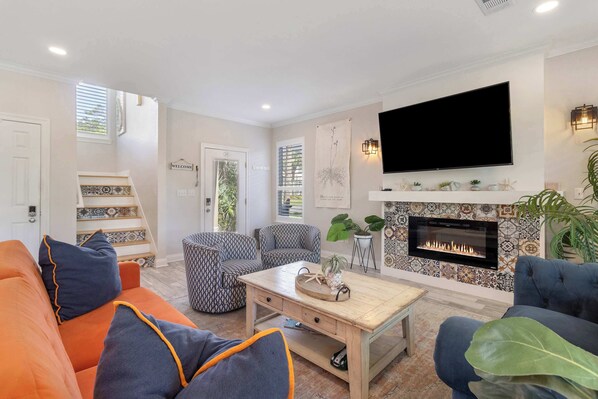 Living room: Main floor, Smart TV (55”), Roku, central heat and A/C, open layout