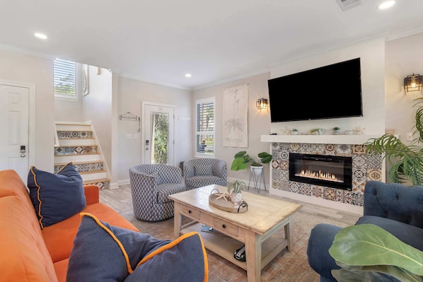 Living room: Main floor, Smart TV (55”), Roku, central heat and A/C, open layout