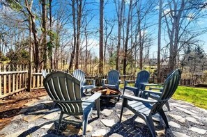 End your day with crackling flames and great company—this firepit is the perfect place to unwind.