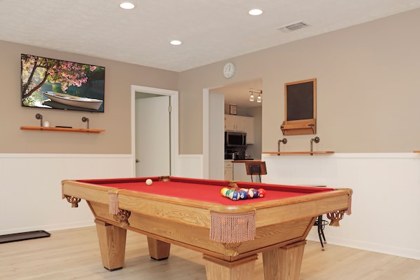 Game Room with Pool Table and TV