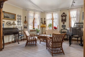 Beautifully restored living room with antique furnishings and natural light