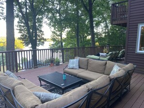 Wrap around deck with lots of comfortable seating areas & a hammock!
