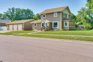 Property Exterior | 2-Story Home | Spacious Yard | Patio w/ Seating
