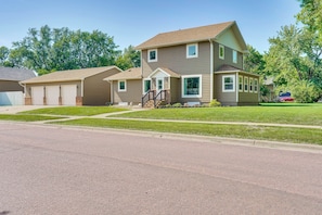 Property Exterior | 2-Story Home | Spacious Yard | Patio w/ Seating