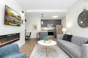 Open to kitchen, dining room