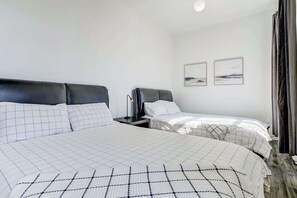 Plenty of comfort awaits in this inviting bedroom.