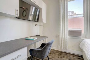 Bedroom 3 (the Suite!) features a workspace