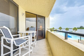 Balcony | Outdoor Dining Area | Pool & Ocean Views