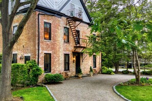 Charming exterior with a classic brick-style finish and inviting curb appeal.