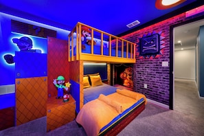 Looking for more adventure? This Mario Bros-themed room lets your little gamers dive into a colorful world of plenty of imagination!