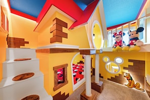 Let your children enjoy the magic of the Mickey Mouse-themed room, where Mickey and his friends bring the fun to life!