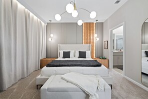 Rest in stylish, high-quality beds after a fun-filled day at the parks.