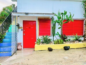 Colorful facade promises a memorable stay.
