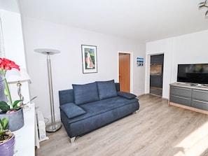 Furniture, Flooring, Interior Design, Floor, Wood, Room, Couch, Living Room, Wood Flooring, Table
