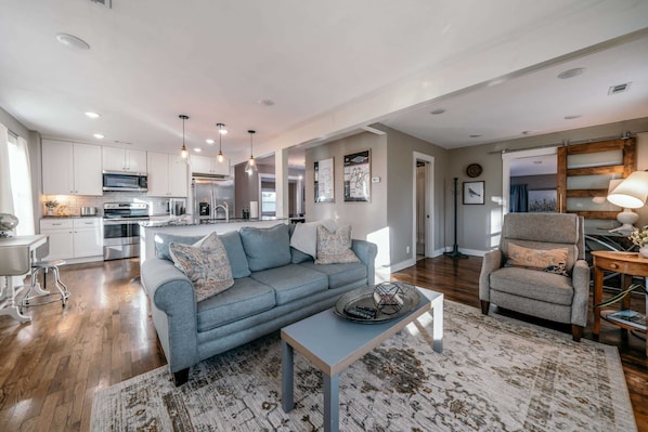 Hard wood floors, open floor plan and quant little neighborhood