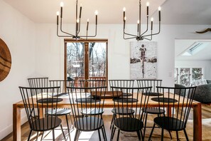 Modern table with seating for 8 plus highchair and bonus bar seating.