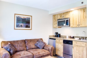Pull Out Sofa and Kitchenette | Listed with @BookTraverse