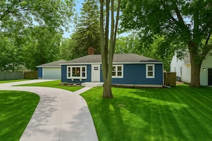 Welcoming front entrance of your private, newly renovated lake-area retreat—comfort starts the moment you arrive.