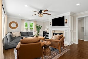 Relax in style in our cozy and elegant living room – perfect for movie nights or morning coffee chats!