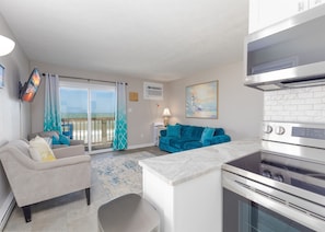 Views of the ocean from the kitchen, flowing into the living room