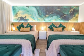 Room with 2 Queen beds, 1 crib, Wi-Fi, TV