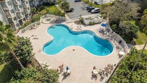Outdoor swimming pool with sun loungers